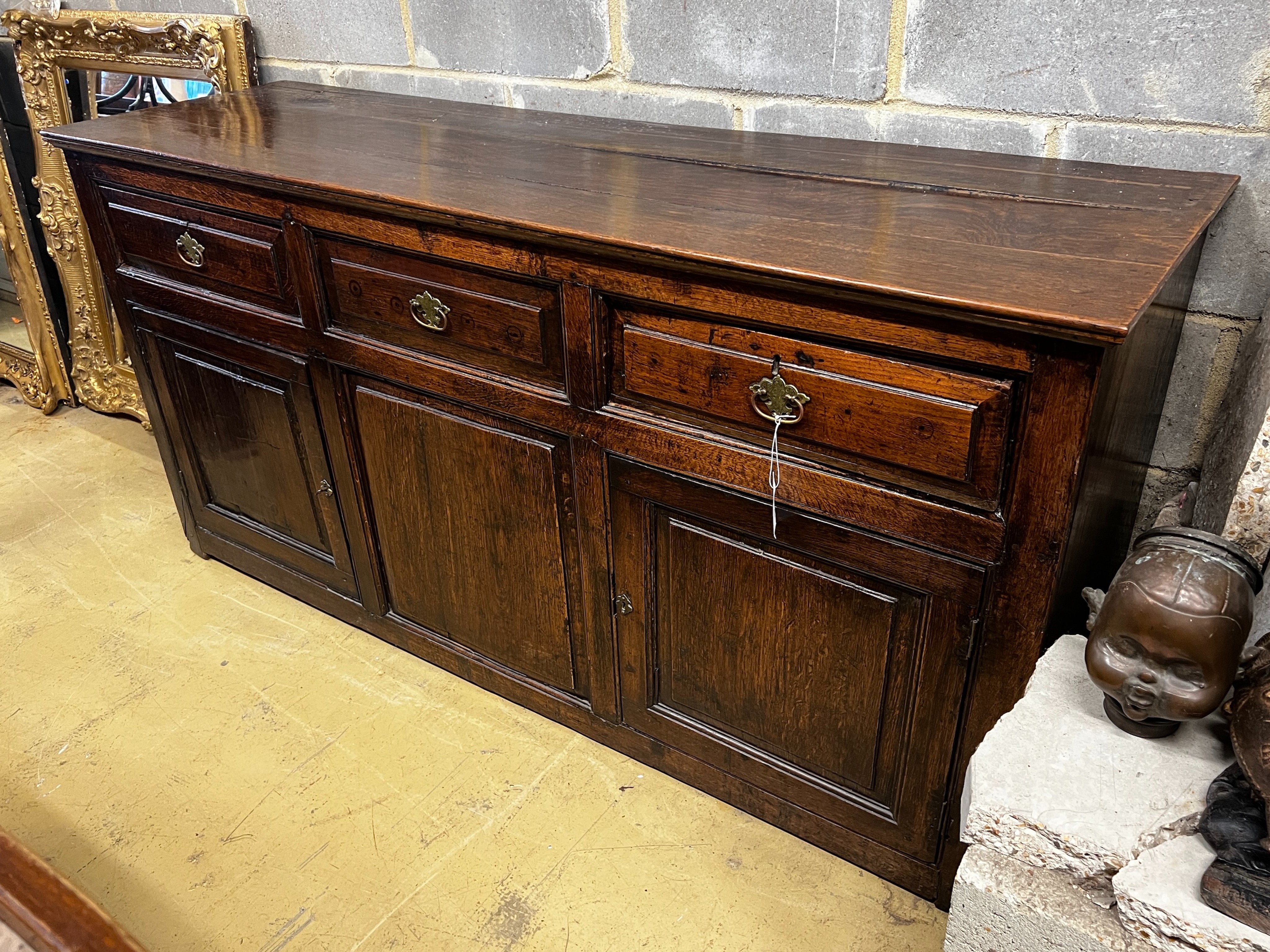 An oak low dresser, width 175cm, depth 50cm, height 88cm